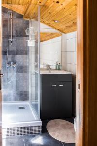 a bathroom with a shower and a sink at Our Friends Apartment in Lisbon