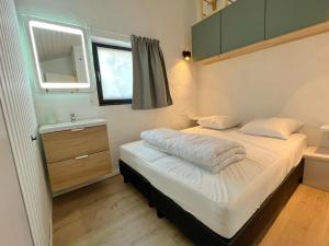 Postel nebo postele na pokoji v ubytování Wanaka lodge