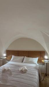 Postel nebo postele na pokoji v ubytování Xenia Boutique Apartment