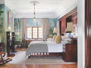 En eller flere senge i et værelse på Le Grand Jardin Villa + 88 billeder