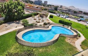 Swimmingpoolen hos eller tæt på PIEZA EN CONDOMINIo