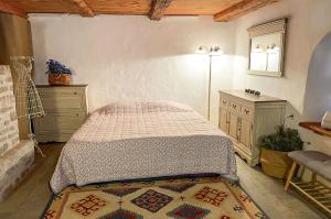 Ένα ή περισσότερα κρεβάτια σε δωμάτιο στο Tôlluste Villa