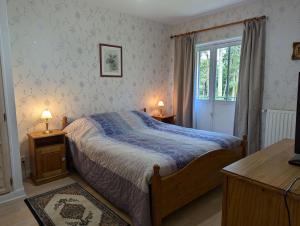 Ένα ή περισσότερα κρεβάτια σε δωμάτιο στο Chambre d'hôtes "Perle", Communs de Bon Hôtel