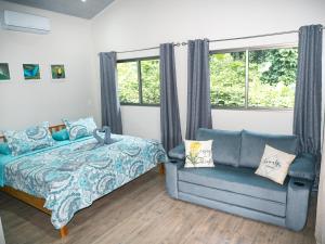 Postel nebo postele na pokoji v ubytování Luxury Apartments Nauyaca by Paradiselodge