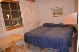 En eller flere senge i et værelse på Castillo Teerenpesue B 16