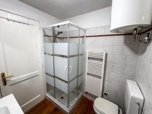 Koupelna v ubytování Pila- ski in ski out- appartamento YUMI + 4 fotografie