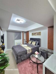 Ένα ή περισσότερα κρεβάτια σε δωμάτιο στο Azure North Bali 26th