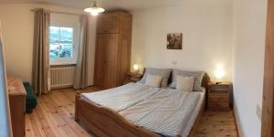 Ένα ή περισσότερα κρεβάτια σε δωμάτιο στο Rasterhof