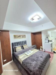 Ένα ή περισσότερα κρεβάτια σε δωμάτιο στο Azure North Bali 26th