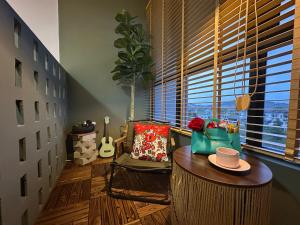 Khu vực ghế ngồi tại Chic Homestay with Mini Cafeteria at Gamuda Garden +14 ảnh