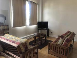 Μια τηλεόραση ή/και κέντρο ψυχαγωγίας στο Le Loft des Milles-Îles