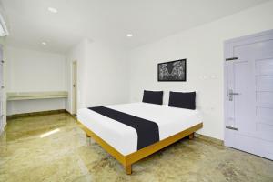 Φωτογραφία από το άλμπουμ του Hotel O Quilon Residency σε Perumanseri +22 φωτογραφίες