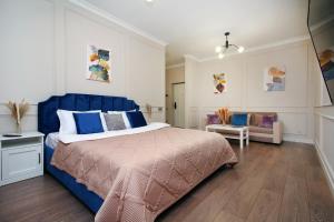 En eller flere senge i et værelse på Blueberry elegance