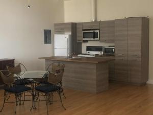 Η κουζίνα ή μικρή κουζίνα στο Le Loft des Milles-Îles +7 φωτογραφίες