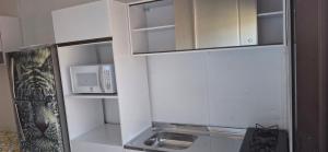 Kuchyň nebo kuchyňský kout v ubytování Containers sol e aço