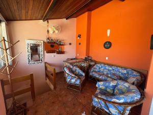 Χώρος καθιστικού στο Cobertura Duplex frente Praia Massaguaçu 6 pessoas com vista e piscina