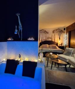 Ένα ή περισσότερα κρεβάτια σε δωμάτιο στο Bienvenue chez Glad et Guigui