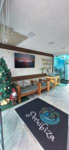 Et tv og/eller underholdning på Pousada Peruibiza