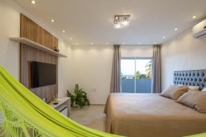 TV/trung tâm giải trí tại Casa Porpora Cumbuco