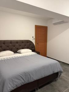 Giường trong phòng chung tại Appartement Étoile