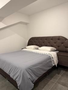 Giường trong phòng chung tại Appartement Étoile +4 ảnh