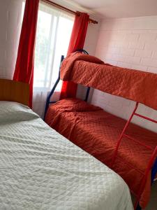 Ένα ή περισσότερα κρεβάτια σε δωμάτιο στο Casa completa amplia terraza y estacionamiento +1 φωτογραφίες