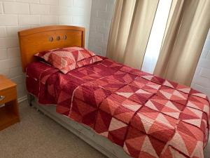 Ένα ή περισσότερα κρεβάτια σε δωμάτιο στο Casa completa amplia terraza y estacionamiento