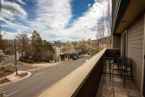 a balcony with a view of a street at The Bard's Inn - BW Signature Collection by Best Western in Ashland
