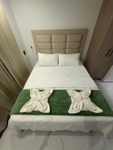 Ένα ή περισσότερα κρεβάτια σε δωμάτιο στο Caribbean Dream Suite