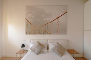 Postel nebo postele na pokoji v ubytování Ca Mantoet - The Green Loft with terrace