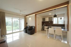 مطبخ أو مطبخ صغير في Mirage Luxuria Inn