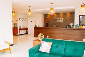 Ο χώρος του λόμπι ή της ρεσεψιόν στο Augusta Centro Hotel