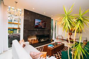 Μια τηλεόραση ή/και κέντρο ψυχαγωγίας στο Augusta Centro Hotel