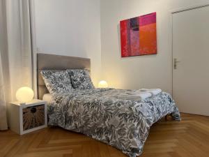 Ένα ή περισσότερα κρεβάτια σε δωμάτιο στο Strasbourg Tivoli