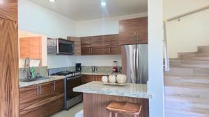 Η κουζίνα ή μικρή κουζίνα στο Casa con alberca privada