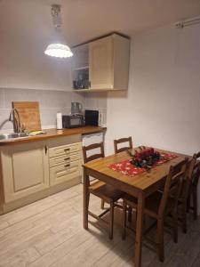 Kuchyň nebo kuchyňský kout v ubytování Bungalow 1Eickhof + 8 fotografií