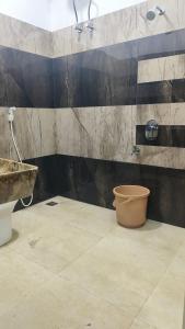 Ένα μπάνιο στο Guru Residency Pondicherry