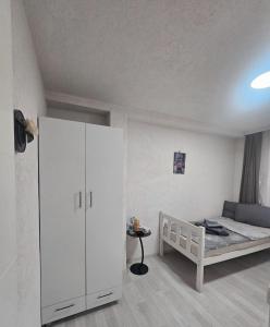 Postel nebo postele na pokoji v ubytování SARA TOUR APART Hostel