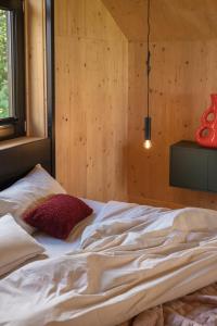 Ένα ή περισσότερα κρεβάτια σε δωμάτιο στο Holi Huus A