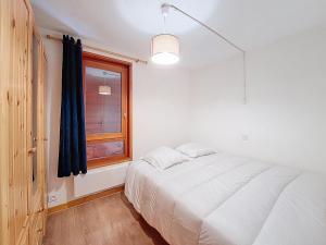 En eller flere senge i et værelse på Enchaple A5