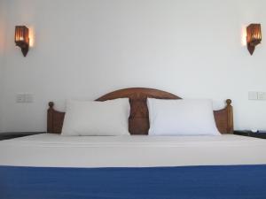 Łóżko lub łóżka w pokoju w obiekcie Bay Reach Home Stay