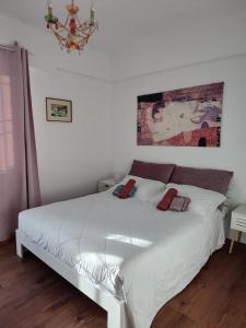 Postel nebo postele na pokoji v ubytování Chill out Home Fregene Family Group Accomodation - 15 minuti da Fiumicino - Casa Vacanza Fregene vicino al mare