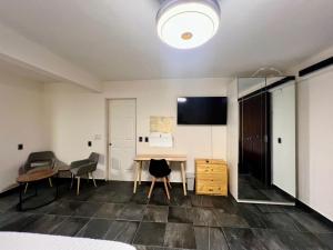 Et tv og/eller underholdning på LA ESTANCIA, Casa EA Oaxaca, Centro Histórico, Balcón a las Montañas