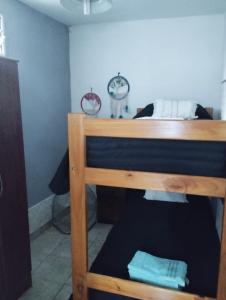 Ένα ή περισσότερα κρεβάτια σε δωμάτιο στο DEPTO en COSQUIN EXCELENTE UBICACION