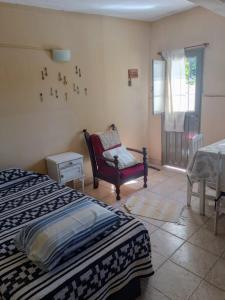 Ένα ή περισσότερα κρεβάτια σε δωμάτιο στο DEPTO en COSQUIN EXCELENTE UBICACION