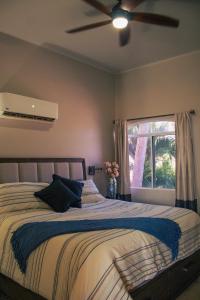 Ένα ή περισσότερα κρεβάτια σε δωμάτιο στο Casa de las Olas