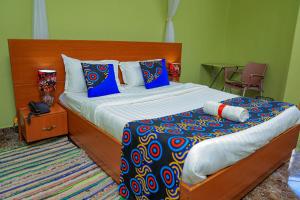 Ένα ή περισσότερα κρεβάτια σε δωμάτιο στο Entuiga cottages