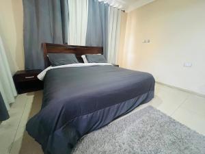 Postel nebo postele na pokoji v ubytování Camp David Apt