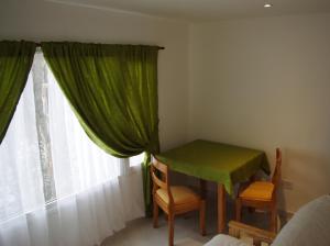 Uma área de estar em Familia Piatti B&B - Suites mais 37 fotos