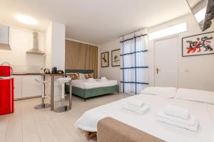 Postel nebo postele na pokoji v ubytování Flat in Duomo